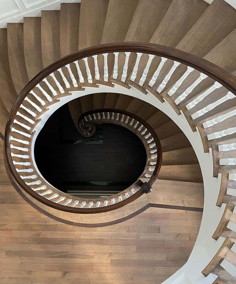 4" Rift and quartered red oak spiral staircase sanded and stained.